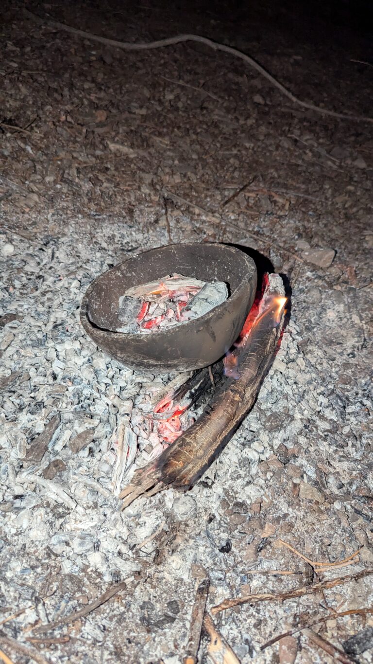 Handmade pot from wild clay, a find while at a lake that had us going day camping the next week to fire it.